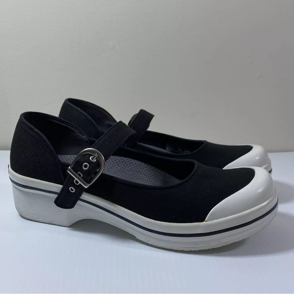 dansko vegan canvas clogs